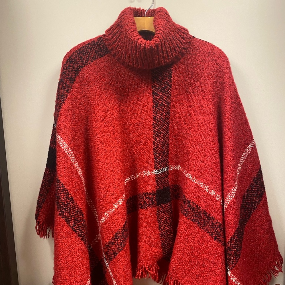 Turtleneck fringe cape